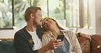 Laughing, phone and couple on sofa in home for networking online together in living room. Happy, cellphone and man with woman for relaxing with connectivity on mobile app or social media in house.