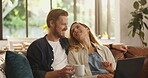 Smile, couple and relax with laptop at house for browsing website, watching movie and streaming film. People, coffee and online for media research, surfing internet and multimedia for entertainment