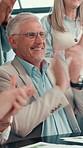 Happy, businessman or meeting with applause for congratulations or team success at office. Mature man, employees or colleagues clapping with documents for winning, thank you or promotion at workplace