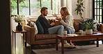 Frustrated couple, conflict or home with fight on sofa for argument, divorce or cheating affair. Upset, man or woman shouting with disagreement or dispute for blame, toxic relationship or breakup