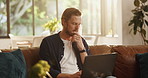 Remote work from home, thinking or man on couch, laptop or problem solving with online editing. Person, freelancer or writer with idea, pc or research for article, creativity or feedback for proposal