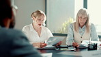 Business people, charts and teamwork in office, documents or cooperation with budget report. Employees, accounting or financial advisor in meeting, paperwork or planning for profit growth or feedback