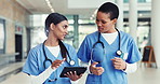 Walking, team and nurses talk with tablet in hospital for healthcare, diagnosis update and results. Women, technology and discussion with medical surgeon for planning, report and clinic schedule