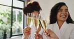 Friends, laughing and toast with wine at spa for pamper date, celebration and gossip joke. Hotel room, happy women and cheers with alcohol drink for vacation break, luxury bonding and reunion weekend