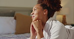 Relax, thinking and woman with robe on bed for daydreaming in morning on weekend. Memory, reflection and happy female person in bedroom of hotel bedroom for holiday, getaway or vacation at resort.