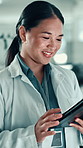 Healthcare, scientist and woman with tablet, lab and online for cure of illness or medical research. Clinic, oncologist and person with tech for analysis, diagnosis and digital records for cancer