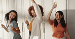Dance, wine and girl friends in kitchen with fun, bonding or cooking dinner together in home. Energy, rhythm and group of women with music for preparing food for supper with alcohol drinks in house.