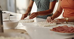 Hands, people and press dough in kitchen for meal preparation, homemade pizza and bonding. Women, friends and cooking with ingredients of traditional lunch, culinary skills and shape process at house