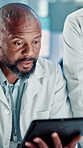 Science, healthcare and people on tablet in lab for medical research, results and feedback. Team, pharmaceutical and scientists talking on tech for vaccine study, breakthrough or medicine discovery