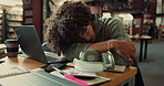 Man, tired and student in library, laptop and stress with deadline for assignment. Nap, university and person with computer, exhausted or mental health with burnout, overworked or sleepy with fatigue