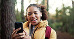 Girl, hiking and phone with video call in forest with chat, smile and contact on break in summer. African woman, smartphone and happy with hello, talking and social network in woods on path in Kenya
