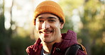 Face, hiking and man in forest, smile and nature with fitness, hobby and environment. Portrait, happy person and hiker in woods, countryside and exercise with break, journey and banner with health