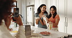 Vlog, friends and influencer in kitchen, baking or fun with dough in home, women or online tutorial. Phone screen, laughing or people with smile for content creation, cooking or tips for social media
