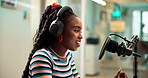 Happy, black woman and broadcast with mic, headphones or tablet for audio podcast at office. Female person, announcer or commentator talking on air for radio communication, news or announcement