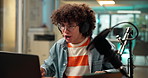 Laptop, shock and man with microphone for podcast, multimedia or radio DJ in studio. Audio equipment, surprise and male person with recording for online broadcast, announcement or live streaming