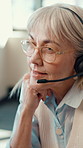 Mature woman, headset and technical support agent in office with online consultation for crm, helpdek or advice. Audio tech, customer service and female call center consultant with troubleshooting.