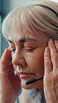 Stress, woman and headset with headache in call center for difficult client, burnout or overwhelmed. Agent, customer service and mature person with tension migraine for workload fatigue or overworked