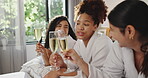 Friends, women and cheers with wine at spa for pamper date, celebration and luxury bonding. Hotel room, happy people and toast with alcohol on bed for vacation break, hospitality and reunion weekend