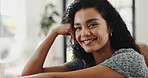Happy, face and woman relaxing on sofa in home with calm, peaceful or morning on weekend break. Smile, confident and portrait of female person from Brazil chilling in living room at apartment.