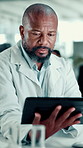 Man, scientist and research with tablet at laboratory for experiment results or medical tests. Male person, science and analysis with technology or exam for new study, discovery or data at clinic