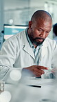 Man, scientist or biologist with sample on computer at lab for exam, test results or research. Male person, science or biology with petri dish for medical study of natural plant or organism at clinic