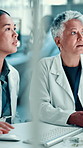 Discussion, tablet and scientists in laboratory for research, discovery or project on DNA. Conversation, science and biologist with manager working on medical RNA for pharmaceutical development.