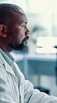 Black man, scientist and medical research at laboratory for experiment or test results. Male person, biologist or science development with technology for breakthrough or new discovery at clinic