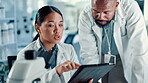 Microscope, science and tablet with people in laboratory for medical development or research. App, healthcare or innovation with scientist and student at work on clinical trial together for discovery