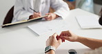 Hands, doctor and patient in office with discussion, notes and medical services in consultation. People, talk and healthcare in wellness, hospital or clinic for diagnosis or professional opinion