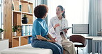 Tablet, doctor and advice with women in office for healthcare exam, patient history and checkup. Digital records, medical diagnosis and help with people in clinic for symptoms survey and report