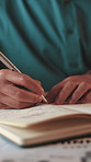 Business, hands and person writing notes for revenue stats, sales analytics or profit growth. Chart, financial advisor and notebook in office for finance research, company expenses or planning budget