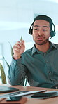 Financial advisor, Asian man and laptop in call center for talking, sales consulting or loan help. FAQ, customer service or finance questions with advice or headset for solution and banking limit