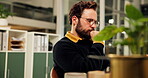 Employee, thinking and man with laptop, office and serious with glasses, plan or marketing strategy. Reflection, brand manager and person with tech for ad campaign, contemplating and research on web
