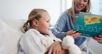 Hospital, book and mother reading with child for bonding, support or family time together. Happy, care and mom with girl kid for enjoying story, novel or literature for learning in clinic room.
