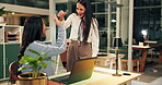 Laptop, fist bump and business women in office at night with good news, promotion or achievement. Teamwork, computer and female designers with celebration for project deadline with goal in workplace.