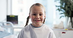 Face, healthcare and smile with child in hospital for pediatrician, illness and recovery. Icu rehabilitation, medical and treatment with girl in bed of clinic for wellness, patient care and checkup