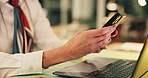 Business person, hands and night with phone on laptop for communication, network or email at office. Closeup, employee or working late with mobile smartphone on computer for chatting or texting app