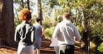 Fitness, people and group running in woods for marathon practice, endurance and outdoor trail. Cardio club, back and jog together in forest for competition, exercise and pace training for performance