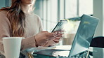 Hands, laptop and typing on phone by coffee for remote work at home for payment, email or budget. Woman, technology and paper for freelancing or small business account management with virtual banking