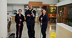 Janitor, team and arms crossed with face, hygiene service and wet floor for disinfection. Portrait, safety and caution sign for risk, cleaning group and maintenance worker for tile polishing and care
