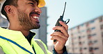 Talking, safety or man with radio for construction site,  inspection or industrial renovation. Smile, city or contractor in discussion on device in outdoor project for progress or quality control