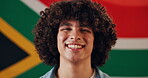 Face, man and happiness with flag for South Africa, confidence and pride with smile for citizen. Portrait, male person or patriotic with fabric for nationality, country or positive attitude by symbol