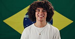 Face, man and freedom with flag for Brazil, voting and happiness with confidence for citizenship. Portrait, male person or patriotic with pride for nationality, country or positive attitude by symbol