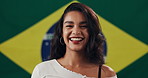 Girl, face and happy with Brazil flag in studio for national pride, confidence and patriot by background. Woman, model and smile in portrait with symbol, respect and sign with loyalty to country