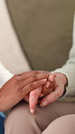 Holding hands, empathy and nurse with senior woman on sofa in nursing home for support. Healthcare, compassion and caregiver with elderly female patient for medical checkup with kindness in house.