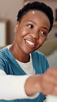 Hand on shoulder, happy and nurse with patient in living room of retirement home for consulting. Healthcare, medical or smile with caregiver woman in apartment for advice, good news or feedback
