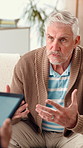 Talking, psychologist and therapy with senior man for help, advice or support for mental health. Chat, guidance and consultation with psychiatrist for rehabilitation or counseling on tablet in office