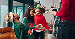 Dance, Christmas and party with friends in home for celebration, festive holiday and happiness. Merry xmas season, bonding and reunion with group of people in living room for love, support and joy 