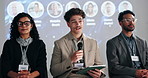 Tablet, speaker or man in panel speech for global economy, awareness forum or finance resources. Presentation, education and people on stage with notes for financial growth, solution or convention