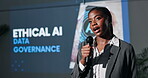 Black woman, seminar and speaker with microphone at event for ethical ai and data governance. Female leader, convention or conference at screen for learning about future of internet, business or tech